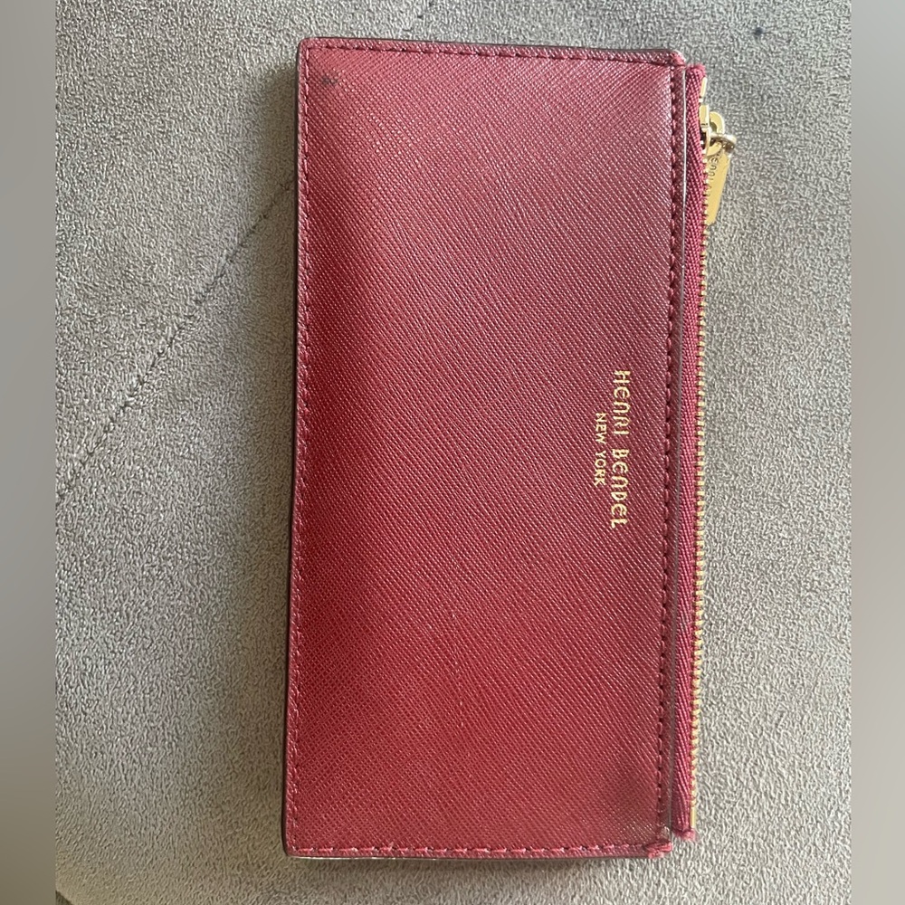 Henry Bendel wallet. Maroon color. In great condition.